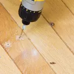 drill holes to drive nails in
