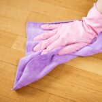 Cleaning the floor with a rag